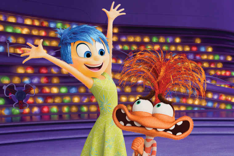 Joy, voiced by Amy Poehler, left, and Anxiety, voiced by Maya Hawke, in a scene from "Inside Out 2." 